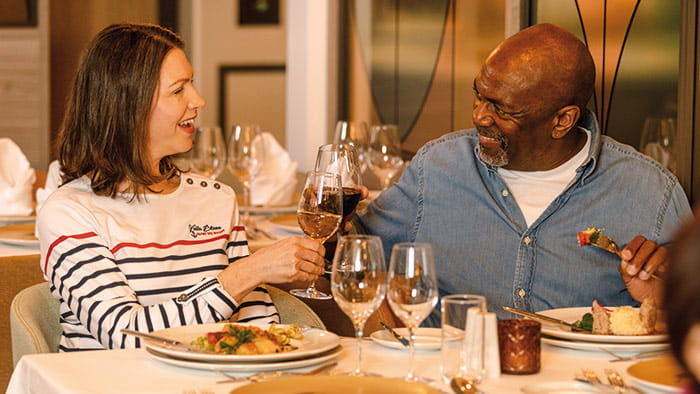 A couple enjoying dinner in the Panorama restaurant on Spirit of the Danube